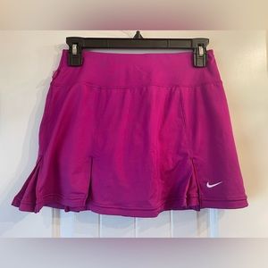 Magenta Nike tennis skirt, size XS